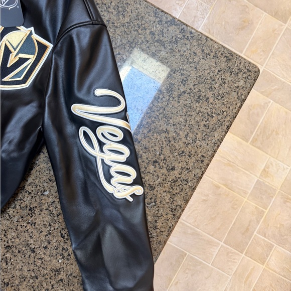 NHL Vegas Golden Knights Black and Gold Faux Leather Jacket - Picture 2 of 6